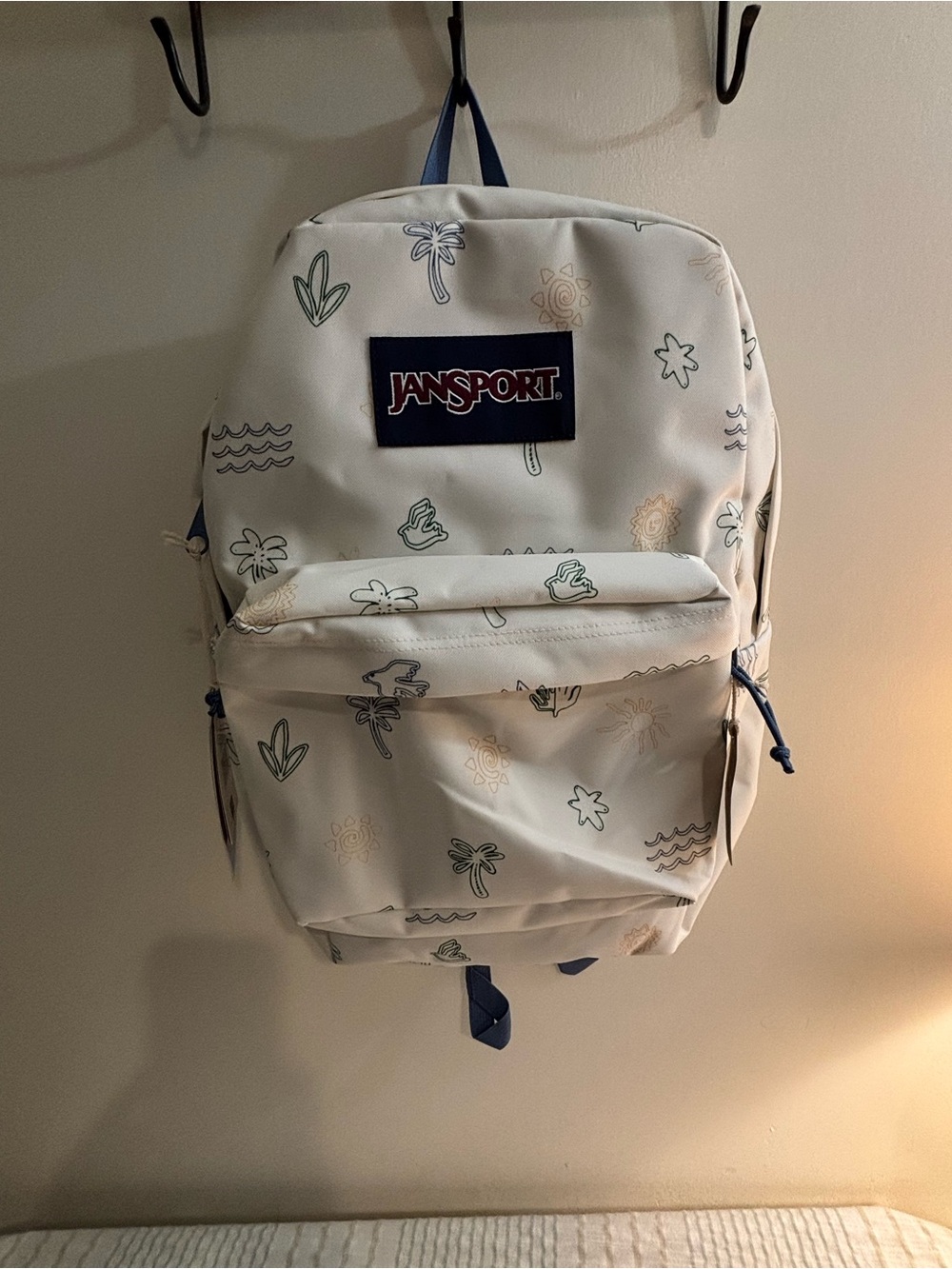 Jansport White Backpack with Green and Tan Accent Prints